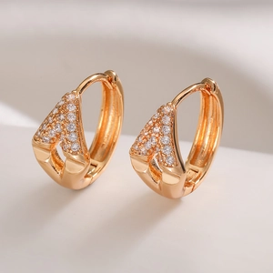 Gold geometric V-shaped huggie earrings set with clear zircon stones for women