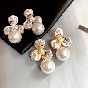 Elegant gold plated floral pearl stud earrings with baroque style petals and round drops