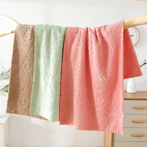 Soft coral fleece facial towels with embossed bear patterns in brown, green and pink