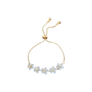 Elegant adjustable gold bracelet with five blue flowers and star zircon accents