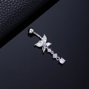 Macro shot of silver butterfly belly ring featuring sparkling zircon tassels and details