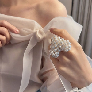 Handmade oversized white pearl heart ring with elegant beaded design for women