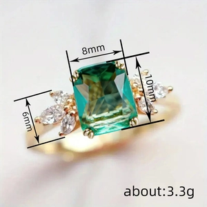 Elegant emerald-cut green gem ring with marquise zircon accents in a gold-plated setting