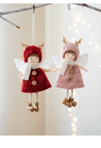 Detail of plush reindeer angel girl ornaments with soft wings hanging on white branches