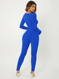Detail of blue ribbed long sleeve jumpsuit showing high-stretch fabric and slim fit back