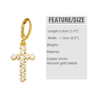 Detail view of gold cross earring with white zircons showing 3.6cm length and 1.3cm width