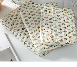 Three-piece quilted floral storage set for iPad and laptop with premium zipper details