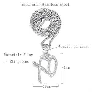 Silver XO iced out pendant necklace with rhinestone details and 41mm height measurement