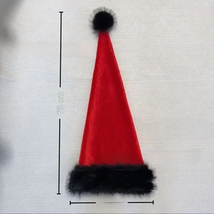 Detail view of a long red Christmas hat with black faux fur trim and dimensions 75x30cm