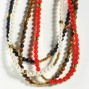 Multilayer beaded necklace with pearls, natural red and tiger eye stones and gold accents