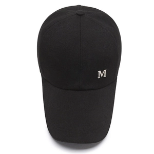 Classic black baseball cap with extended brim and silver metal M logo for outdoor sun protection