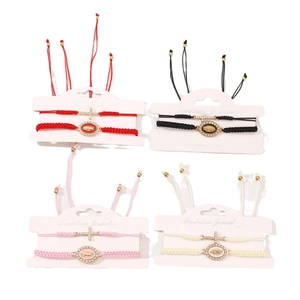 Religious cross and Virgin Mary charm braided rope bracelet set in four colors