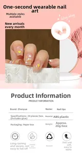 Detail view of rainbow ballet fake nails featuring cute clouds and yellow stars patterns