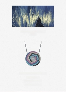 Detail of a round S925 silver pendant with multicolor pavé crystals in a spiral pattern