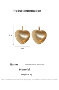 Detailed view of brushed gold-plated heart earrings showing size and copper material specs