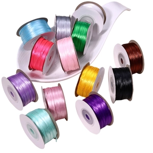 Rolls of 3mm double-sided satin ribbon in multiple colors for DIY gift wrapping