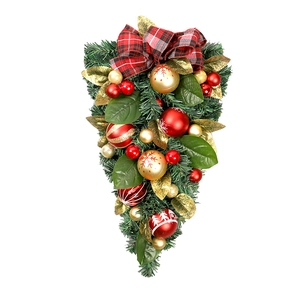 Christmas teardrop wreath with red and gold ornaments and a plaid bow on pine branches