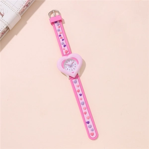 Close-up of pink heart-shaped watch face and colorful silicone strap for kids