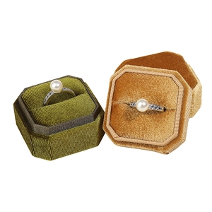 Octagonal velvet jewelry box in olive green and golden yellow with pearl ring display