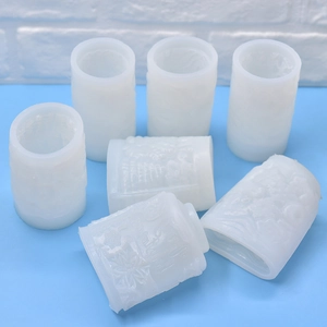 DIY cylindrical silicone molds with embossed Christmas snowflake and tree patterns
