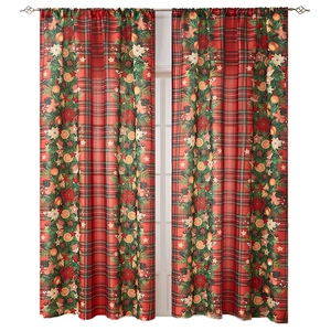 Christmas window curtains with red green plaid pattern and festive wreath decor