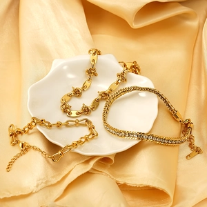 Three-piece set of 18K gold plated titanium steel bracelets featuring zircon accents