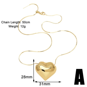 Detail shot of golden heart pendant 28x31mm with 50cm chain and 12g weight specs