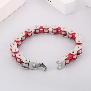 Mens red and silver stainless steel motorcycle chain bracelet on white minimalist cubes