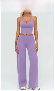 Detail of lilac v-neck halter top and high-waisted wide-leg yoga pants set