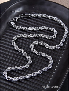 Silver twisted rope chain necklace on black tray, length 60cm and weight 48g detail