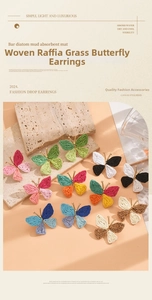 Flat lay of colorful woven raffia butterfly earrings in assorted vibrant styles