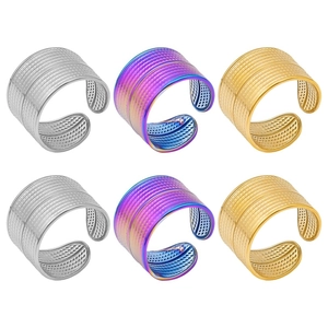 Detailed set of 6 adjustable stainless steel rings with unique dotted texture finish