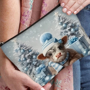 Winter highland cow print makeup bag with Christmas tree motifs and secure zipper closure