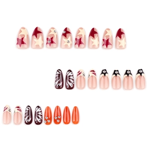 Y2K almond press-on nail kit with star patterns, rhinestones and high-gloss finish