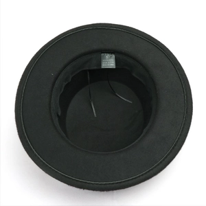 Top view of black wool-like wide brim fedora hat showing interior sweatband and label