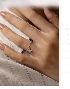 Detail of S925 sterling silver beaded ring featuring a sparkling star pendant on hand