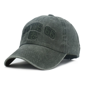 Close-up of Route 66 embroidery on a vintage washed cotton baseball cap with curved brim