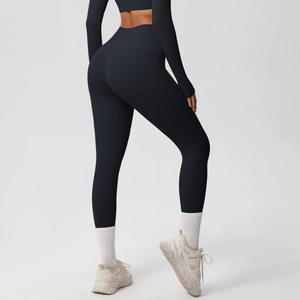 Detail view of high-waist yoga leggings showing lift effect and compression fit