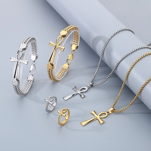 Polished gold and silver Ankh cross jewelry set with necklaces, rings and mesh bracelets