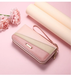 Pink and beige tri-color long wallet with double zippers and elegant gold metal bar detail