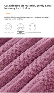 Macro shot of thick rose coral fleece towel showing soft absorbent fibers and texture