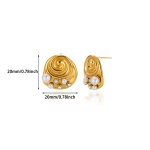 Detail view of 18K gold floral earrings with pearls and micro-set cubic zirconia stones