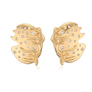 Irregular geometric 18K gold plated earrings with sparkling zircon stones on white background