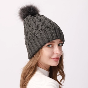 Winter knitted beanie hat with faux fur pompom in dark grey for men and women