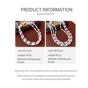 Detail of vintage glass pearl necklaces in 82cm and 158cm lengths with bronze clasp