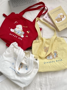 Cute cartoon embroidered canvas tote bag available in red, yellow, and white colors