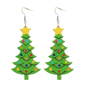 Christmas tree wooden earrings with colorful dots and yellow star on white background