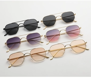 Multiple stylish double-bridge geometric metal sunglasses in various gradient lens colors