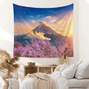 Detailed view of Mount Fuji and cherry blossom tapestry in a cozy bedroom setting