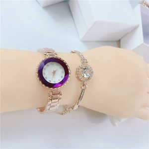 Close-up of rose gold watch set with purple faceted bezel and matching crystal bracelet
